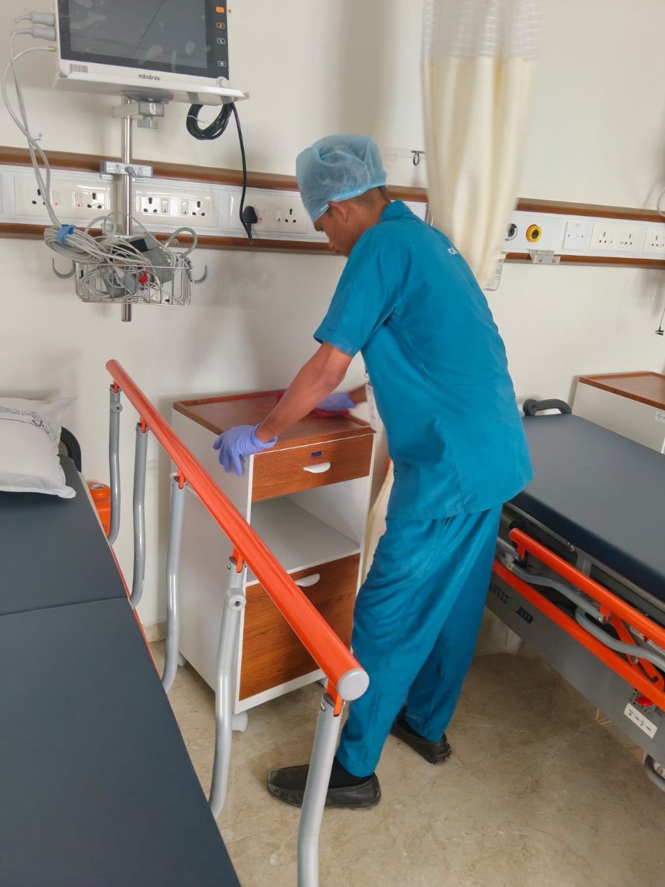 Staff handling hotel linen